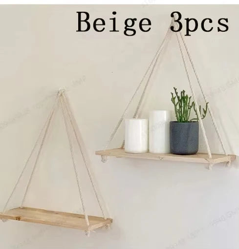 Hängendes Wandregal aus Holz mit Seil