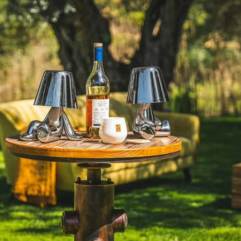 Candeeiro de mesa LED escultural com motivo figurativo