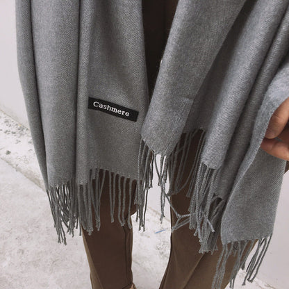 Bufanda de mujer con flecos y diseño liso