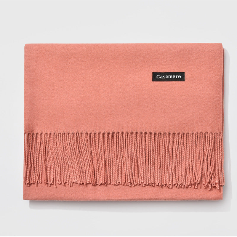 Bufanda de mujer con flecos y diseño liso