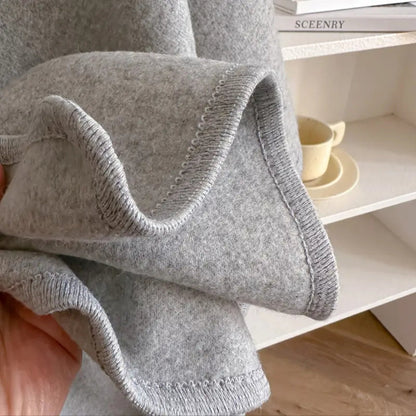 Eleganter Damen-Poncho mit Gürtel für kühle Tage