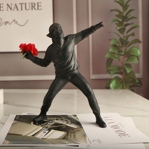Figura decorativa de resina con flores