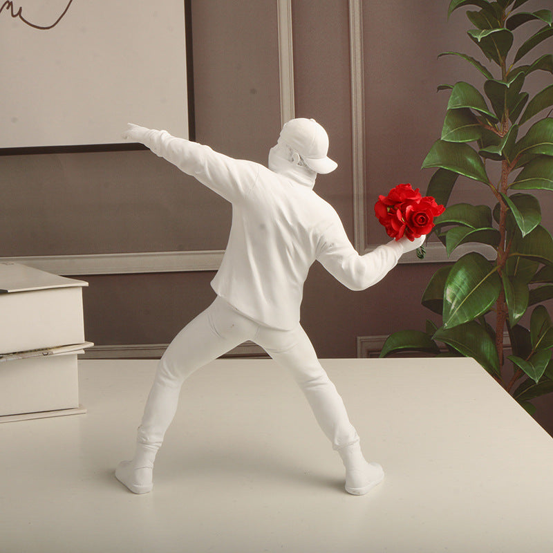 Figura decorativa de resina con flores