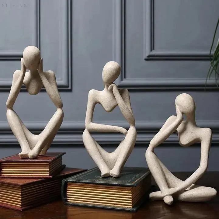 Escultura abstracta de pensador con forma figurativa minimalista