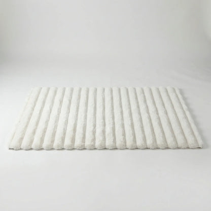 Alfombra mullida de pelo largo con diseño texturizado