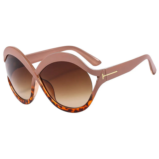 Elegantes gafas de sol redondas de gran tamaño: ligeras y protectoras.