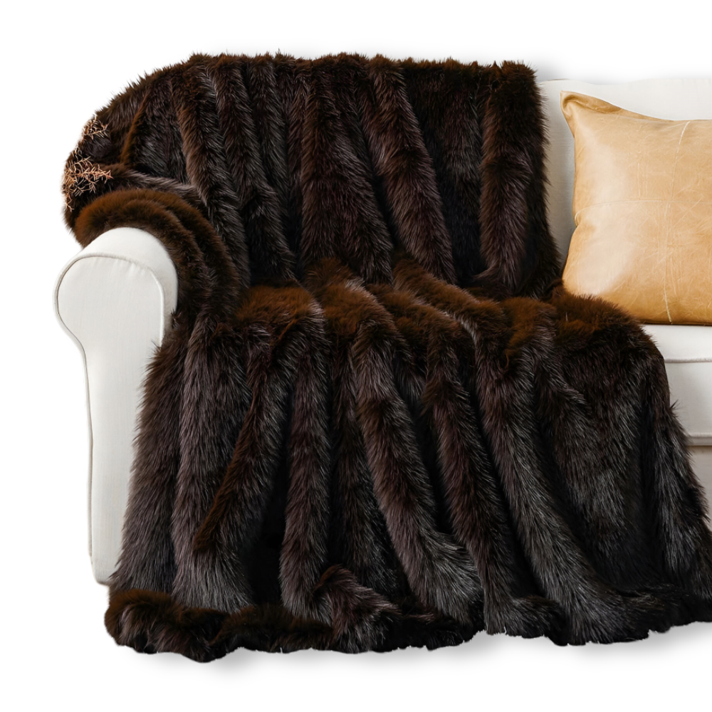 Kuscheldecke in Felloptik mit weicher Rückseite