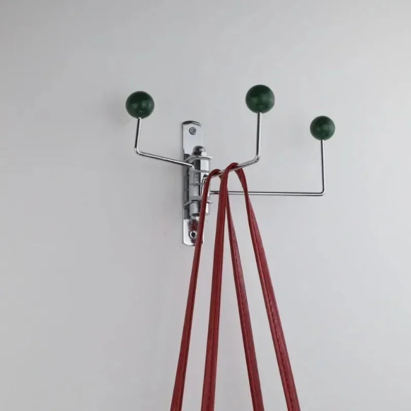 Perchero de pared giratorio con pomos redondos