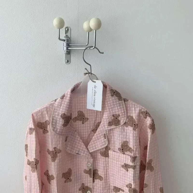 Perchero de pared giratorio con pomos redondos