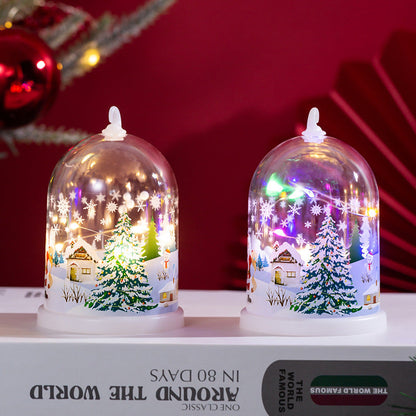 Linterna navideña LED con paisaje invernal iluminado