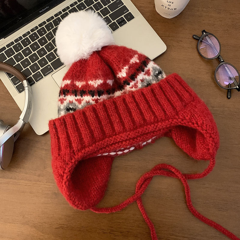 Gorro de punto de invierno con orejeras y pompón
