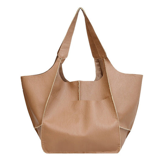 Bolso Sienna de piel vegana: elegante y espacioso para cualquier ocasión.