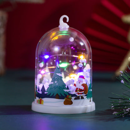 Linterna navideña LED con paisaje invernal iluminado