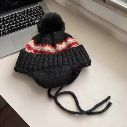 Gorro de punto de invierno con orejeras y pompón