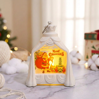 Weihnachtslaterne mit beleuchteter Winterszene