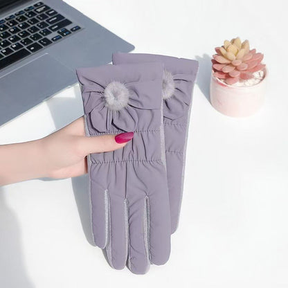 Guantes elegantes para mujer con un suave detalle de lazo