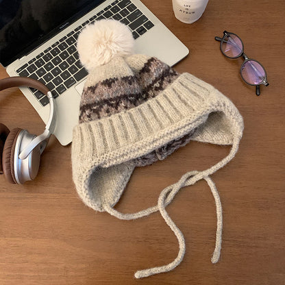 Gorro de punto de invierno con orejeras y pompón