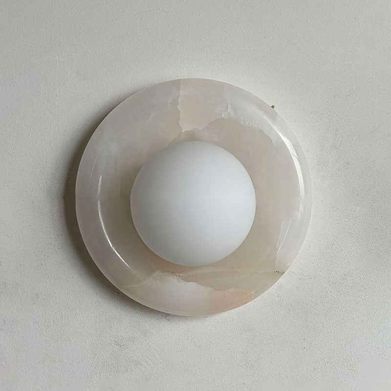 Aplique de pared redondo de mármol con pantalla de vidrio