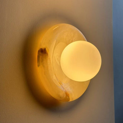Aplique de pared redondo de mármol con pantalla de vidrio