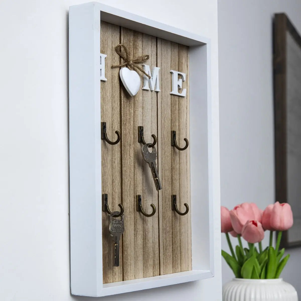 Tablero para llaves de madera con 6 ganchos y la inscripción «Home»