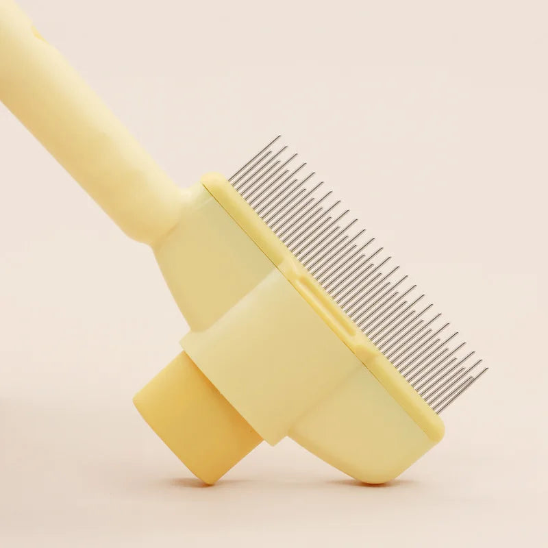 Cepillo autolimpiante para el pelo de los gatos