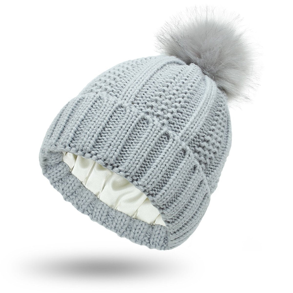Gorro de mujer con pompón y forro interior liso