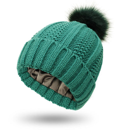 Gorro de mujer con pompón y forro interior liso