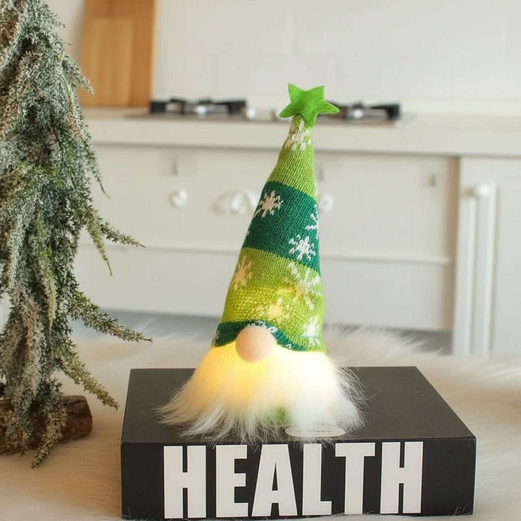 Duende navideño iluminado con gorro de punto