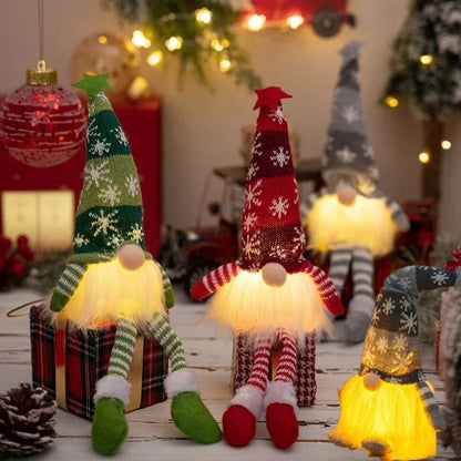 Duende navideño iluminado con gorro de punto