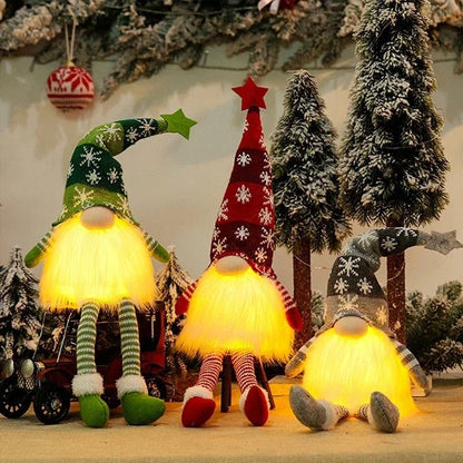 Duende navideño iluminado con gorro de punto