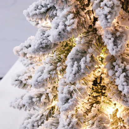 Beleuchteter Mini-Weihnachtsbaum mit Schneeeffekt