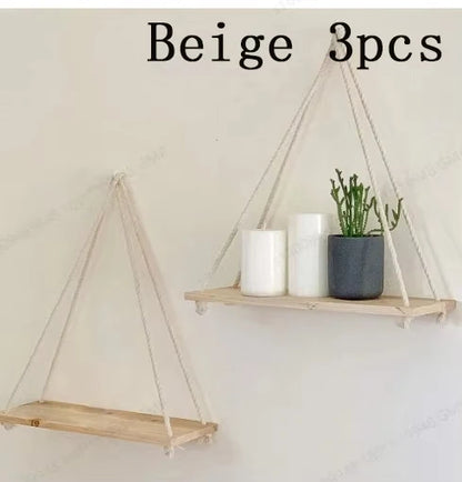 Hängendes Wandregal aus Holz mit Seil
