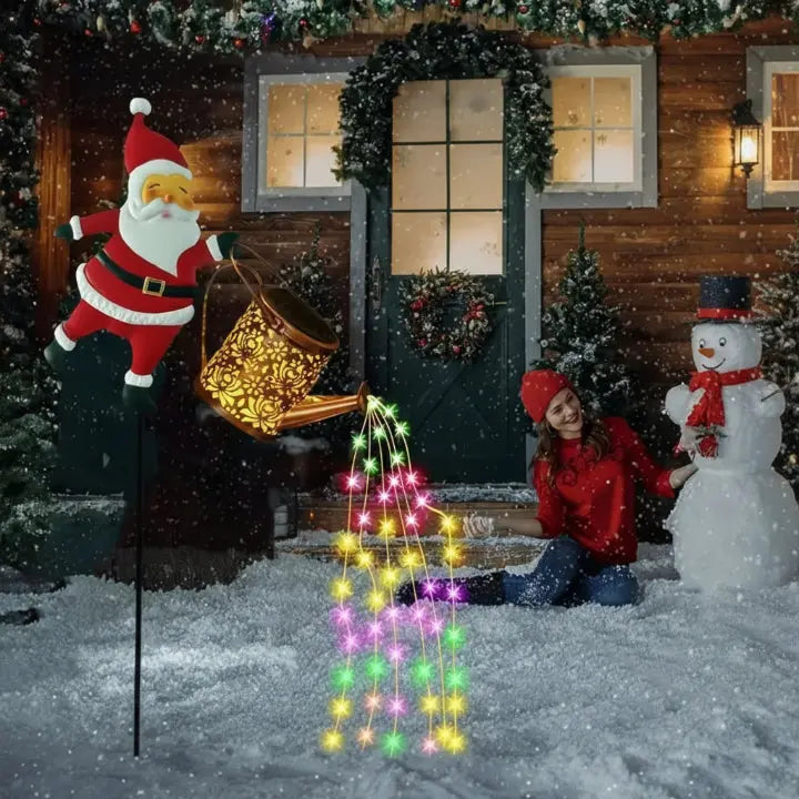 Regador de Natal a energia solar com Pai Natal e cascata de luzes LED multicoloridas