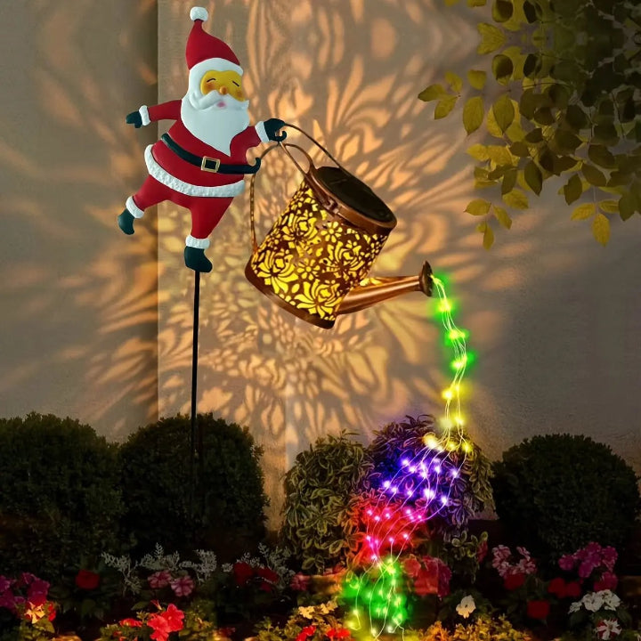 Regador de Natal a energia solar com Pai Natal e cascata de luzes LED multicoloridas