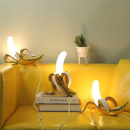 Lámpara de mesa decorativa con forma de banana y luz LED para interiores modernos