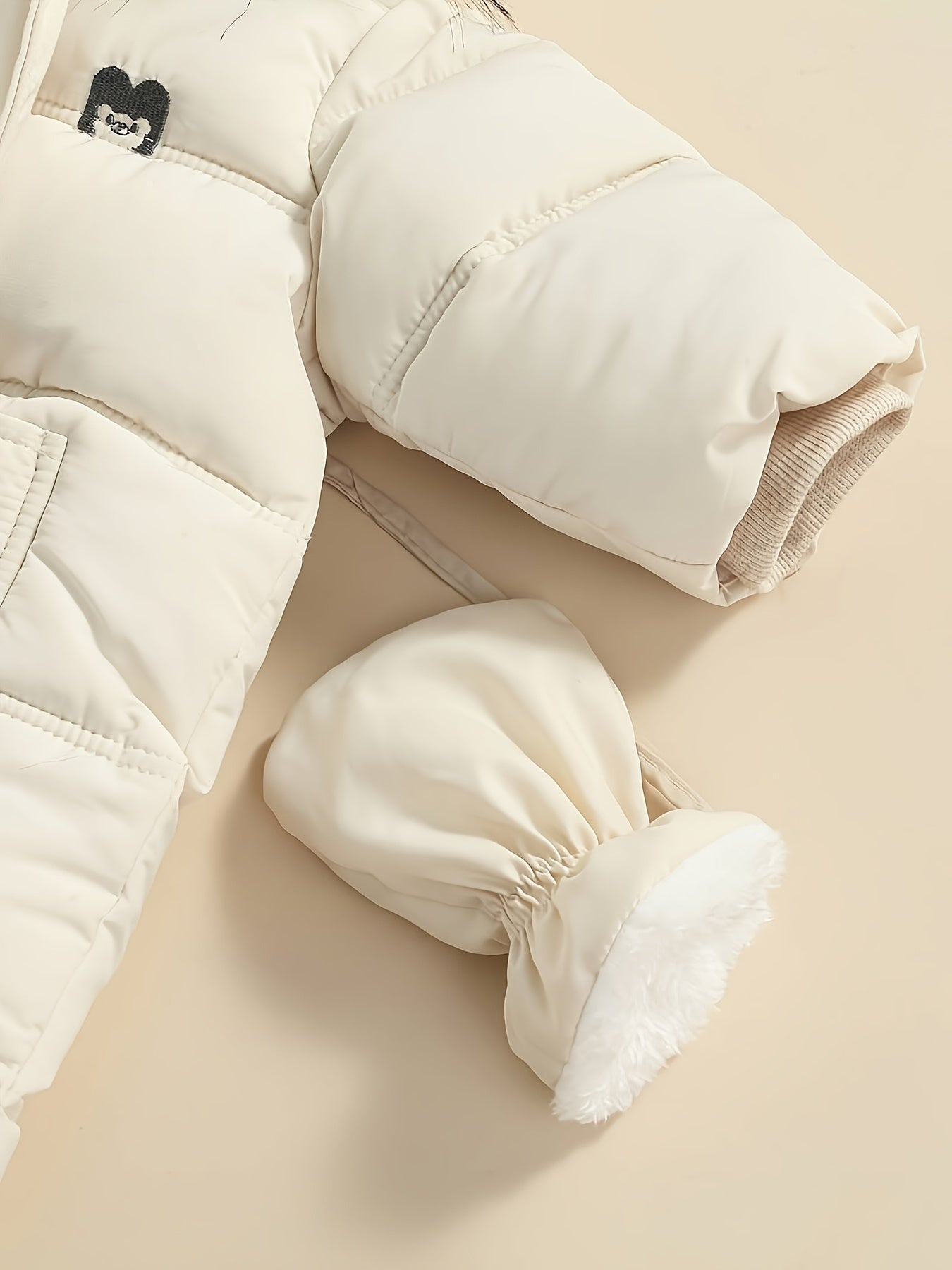 Mono de bebé Snowy: mono de invierno cálido con capucha para uso en exteriores