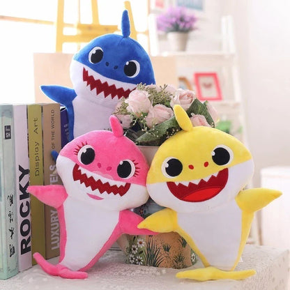 Peluche musical de tiburón con luz