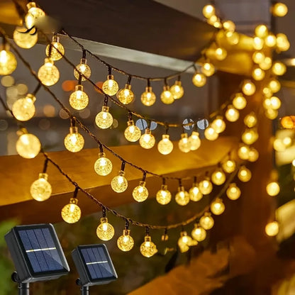 Guirnalda de luces LED solares con esferas: cálidas y acogedoras