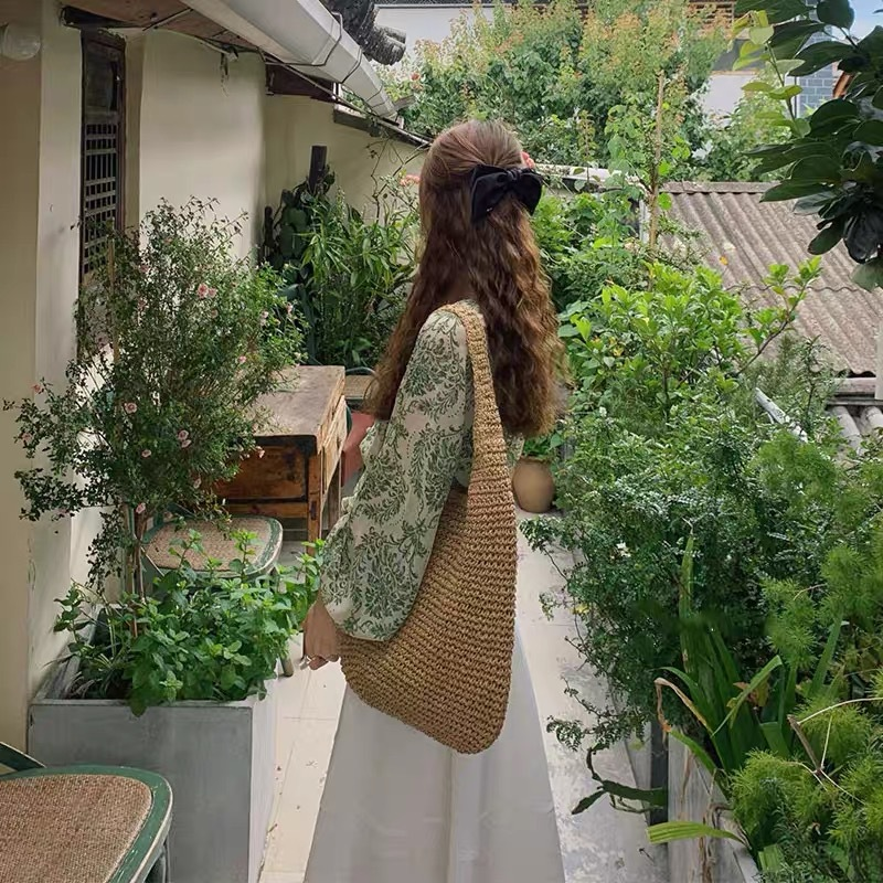 Ženska velika pletena torba za nošenje sa zatvaračem
