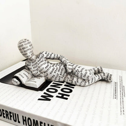 Figura decorativa de lector para estantería y escritorio