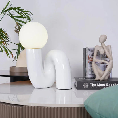 Candeeiro de mesa escultural com esfera de vidro
