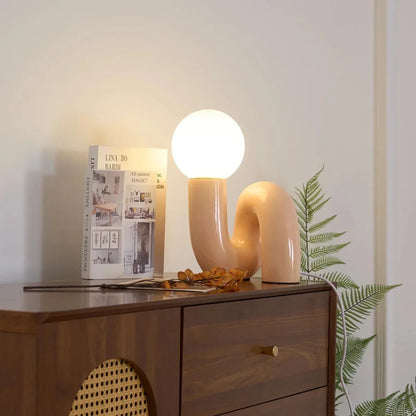 Candeeiro de mesa escultural com esfera de vidro