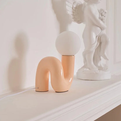 Candeeiro de mesa escultural com esfera de vidro