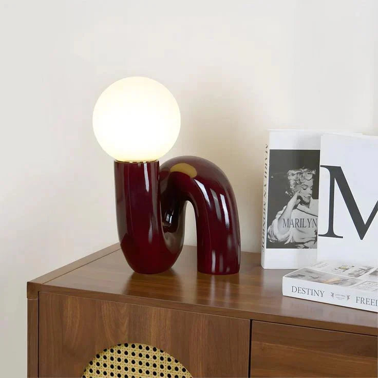 Candeeiro de mesa escultural com esfera de vidro