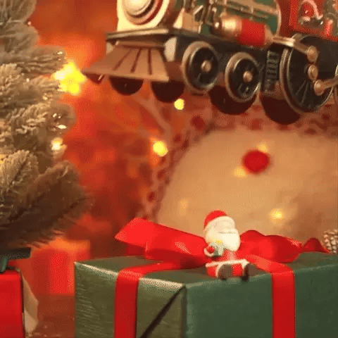 Comboio de Natal iluminado com efeito de neve