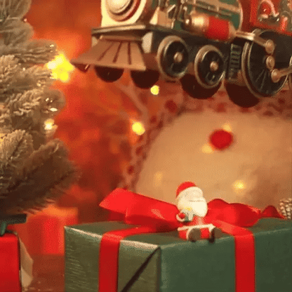 Comboio de Natal iluminado com efeito de neve