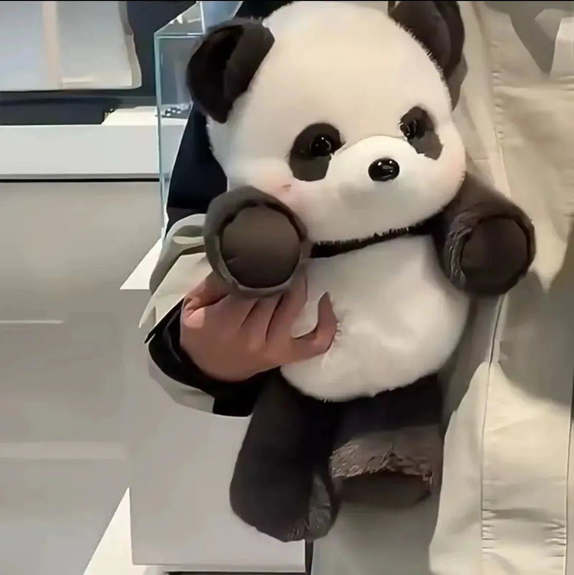 Peluche interativo com braços móveis e pernas dançantes