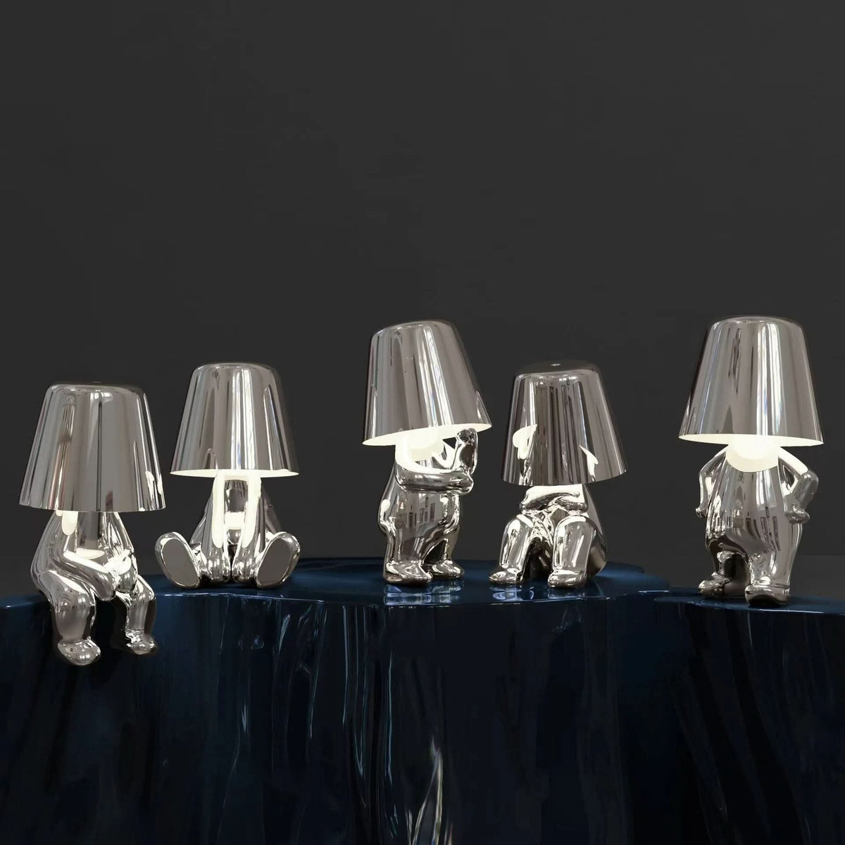 Candeeiro de mesa LED escultural com motivo figurativo