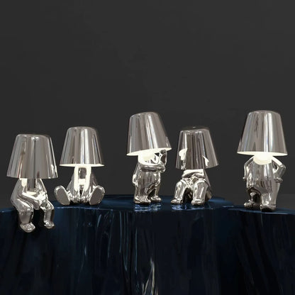 Candeeiro de mesa LED escultural com motivo figurativo