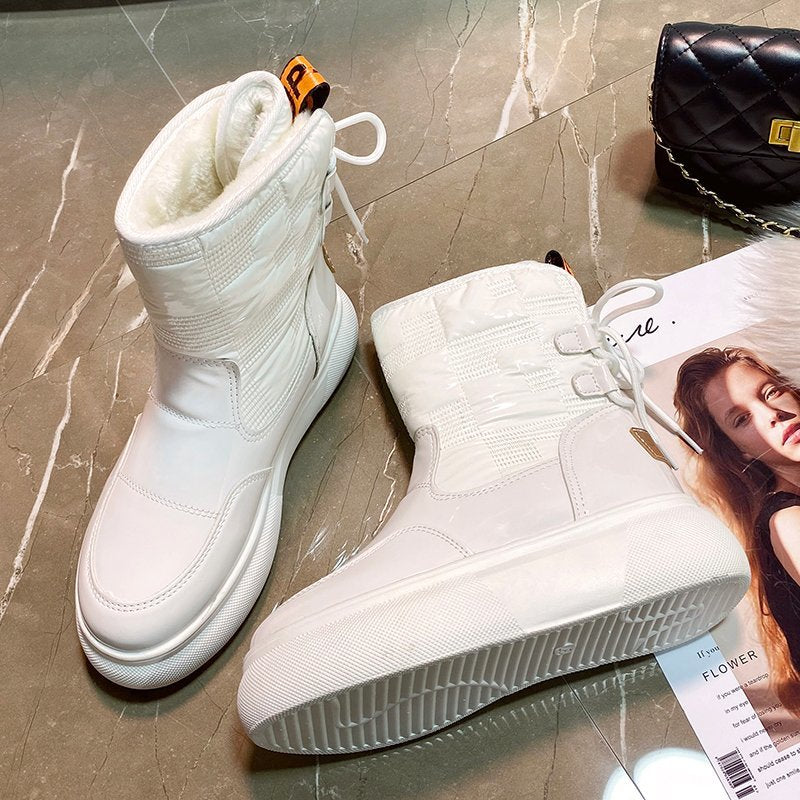 Botas de invierno para mujer con acabado brillante y plataforma